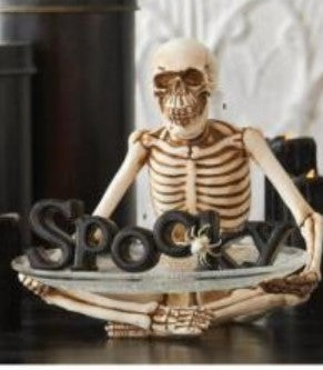 Sitting Skeleton Holding Glass Plate