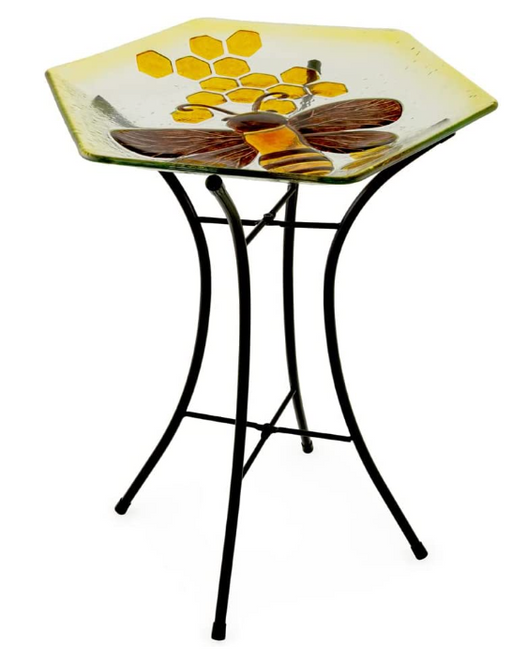 Hexagonal glass table with bee and honeycomb design on a white background