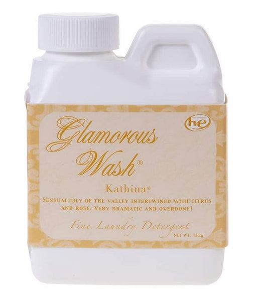 Glamorous Wash laundry detergent bottle with a white label on a white background